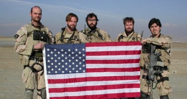 Scott Duffman 3 TSgt Duffman and team with American flag
